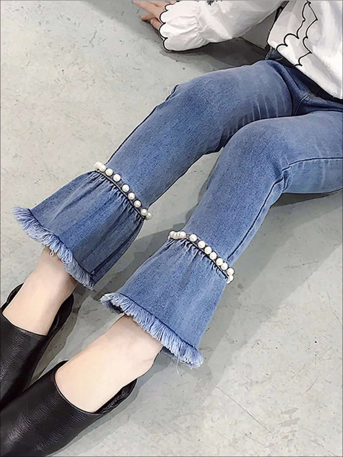 Flare Frayed And Pearl Jeans